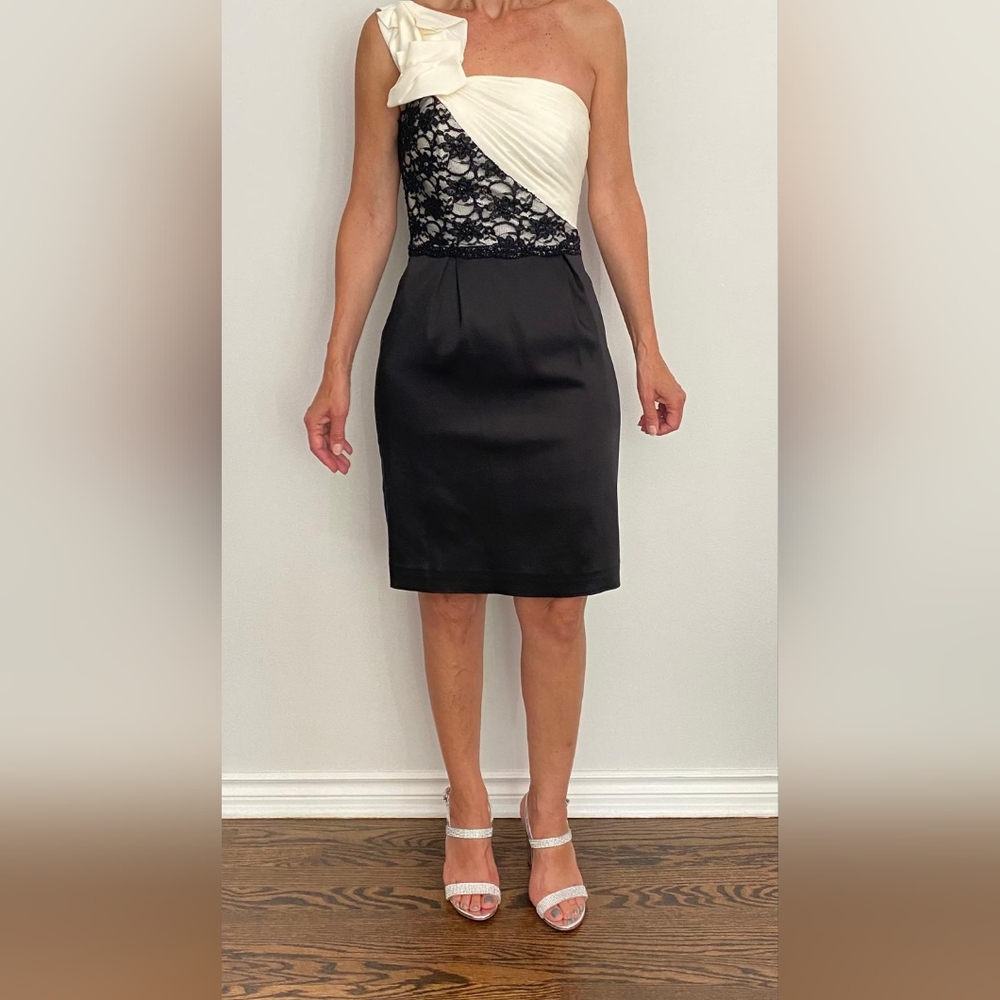 Super elegant black and white cocktail dress. One shoulder,Satin and lace.Size 4